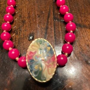 Vibrant Pink Beaded Necklace with Artistic Pendant
